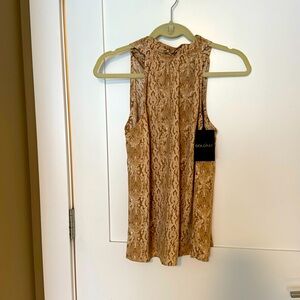 Animal print sleeveless Gold Ray top. Back ties . Brand new with tags.
